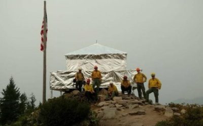 Historic lookout wrapped in fire-resistant material to save it from wildfire